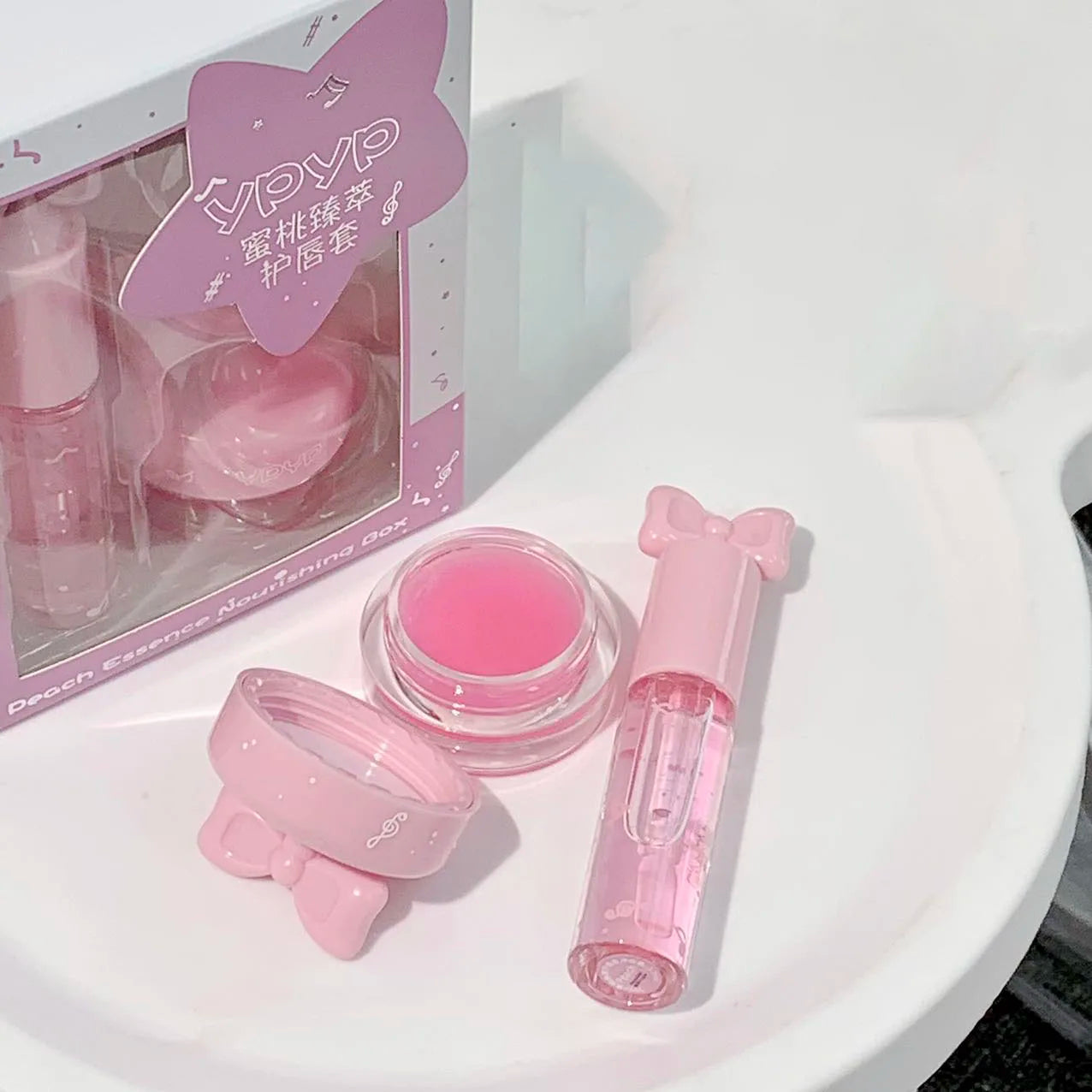 2-delat lip care set – återfuktande lip gloss & lip mask med persikoessens